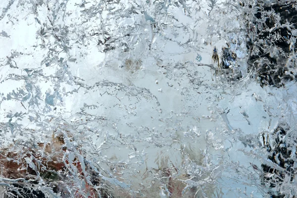 Pared glacial transparente de hielo con patrones . — Foto de Stock