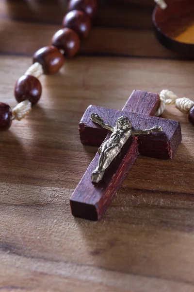 Rosary beads on a table — Stock Photo, Image