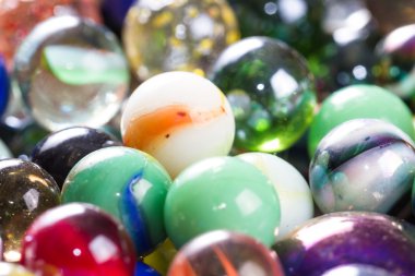 Marbles up close for a background  clipart