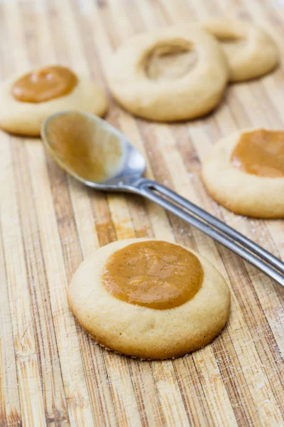Pumping caramel cookies — Stock Photo, Image