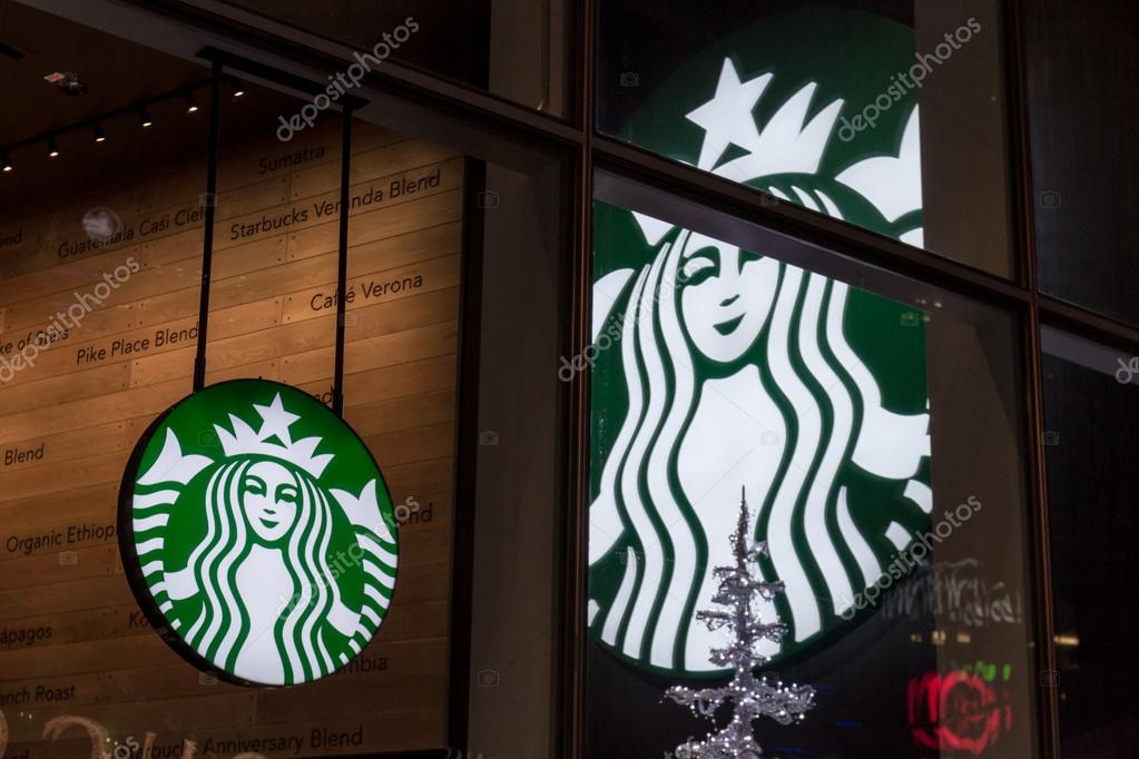 Las Vegas Nevada - December 18 : Starbucks logo on a window with a larger logo on the inside of the store, December 18 2014 in Las Vegas, Nevada