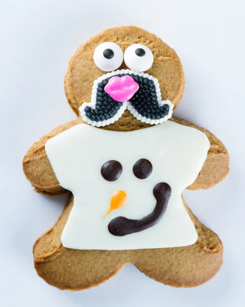 Funny gingerbread cookie on a white background — Stock Photo, Image