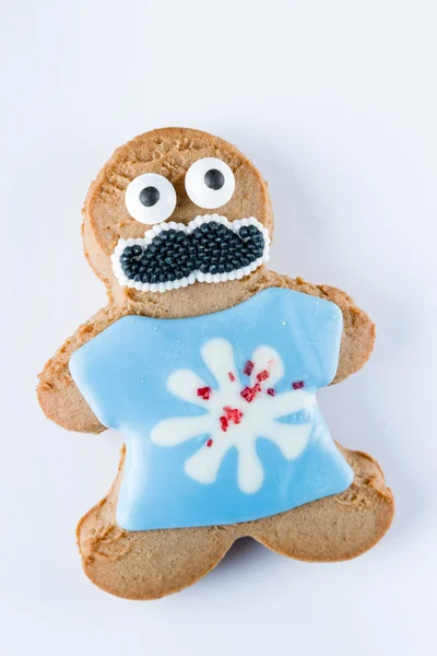 Funny gingerbread cookie on a white background — Stock Photo, Image