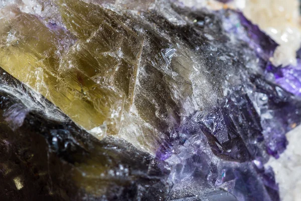 Crystals growing in golds and purple — Stock Photo, Image