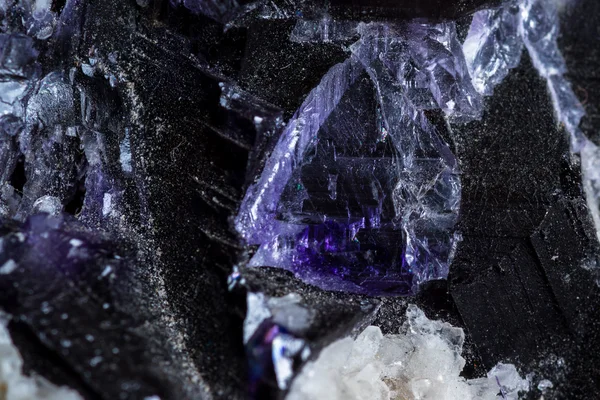 Crystals growing in golds and purple — Stock Photo, Image