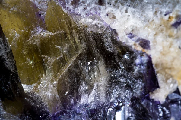 Crystals growing in golds and purple — Stock Photo, Image