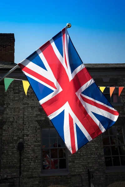 Union Jack Bunting Podświetlone Mieście Rynku — Zdjęcie stockowe