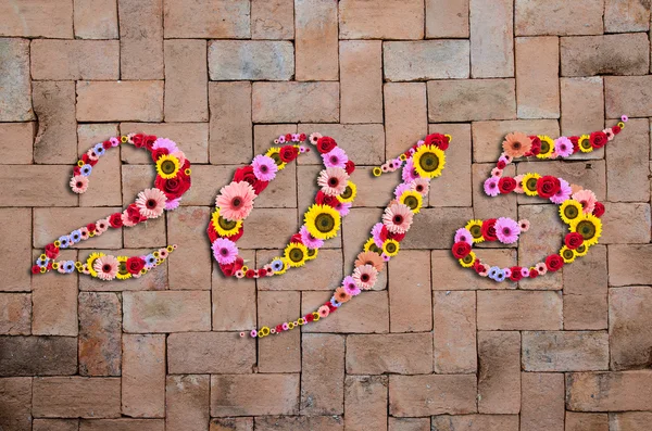 2015 Flores en festivo en ladrillo sin costura Textura Fondo — Foto de Stock