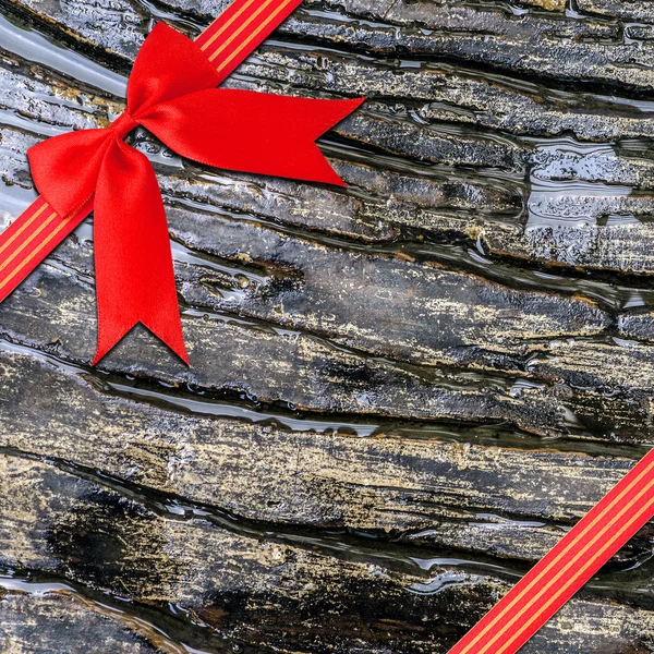 Červená stuha s roh luk — Stock fotografie
