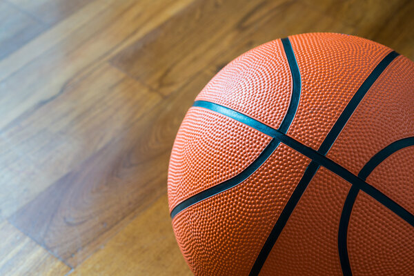 Closeup of Basketball on the Court Floor