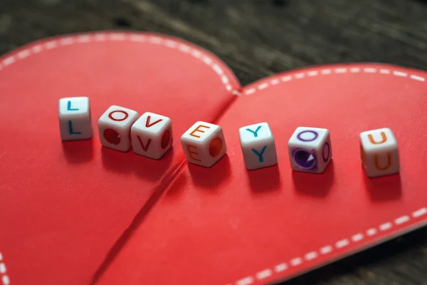 Miłości wiadomości napisane w blokach — Zdjęcie stockowe