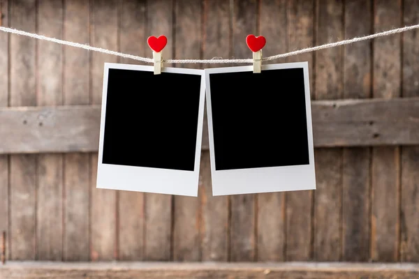 Two Old picture frame hanging on the clothesline — Stock Photo, Image