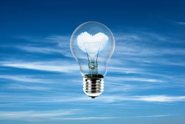 Hearts in light bulb with the power of nature — Stock Photo, Image