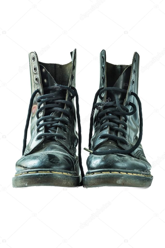isolated used combat leather boots