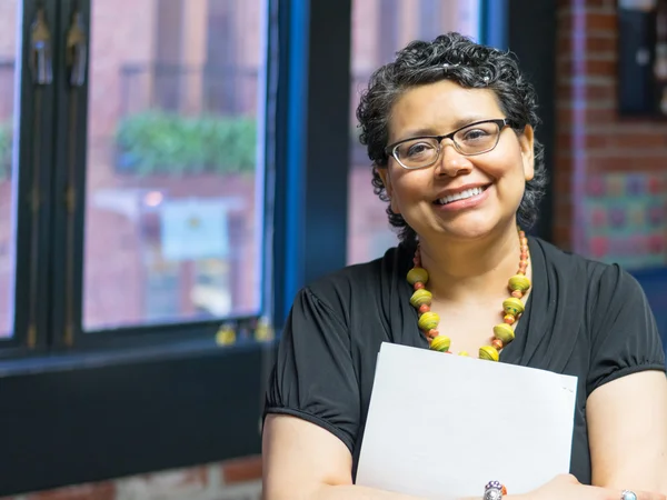 Professional Hispanic Woman Holding Papers — Stock Photo, Image