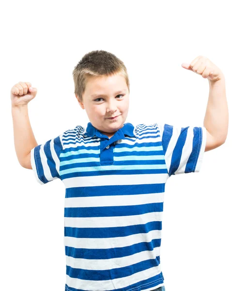 Preteen menino flexando seus músculos mostrando força — Fotografia de Stock