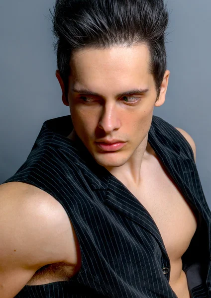 Male In Vest Posing Seated — Stock Photo, Image