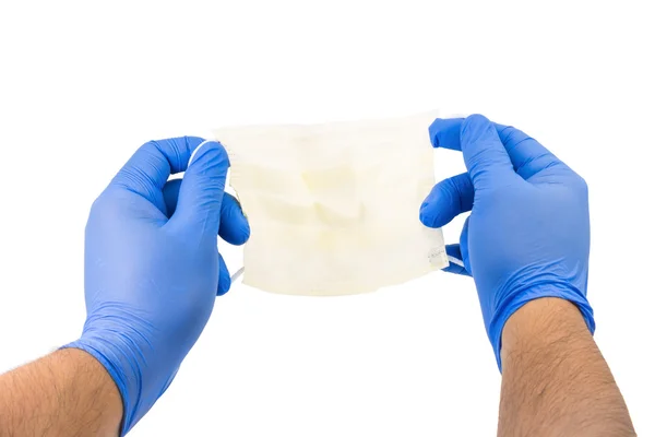 Yüz maskesi Holding Mens eller