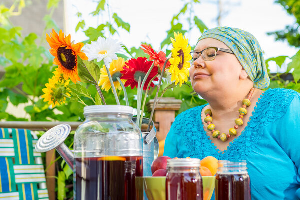 Hispanic Woman Enjoys Evening Snack Outside