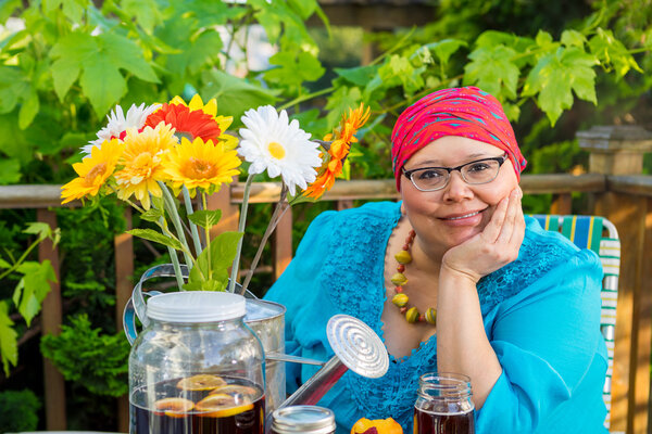 Hispanic Female With Bright Smile Dining Outdoors
