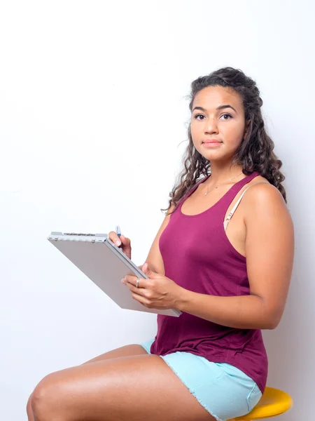 Young Lady Reviewing Paperwork — Stockfoto