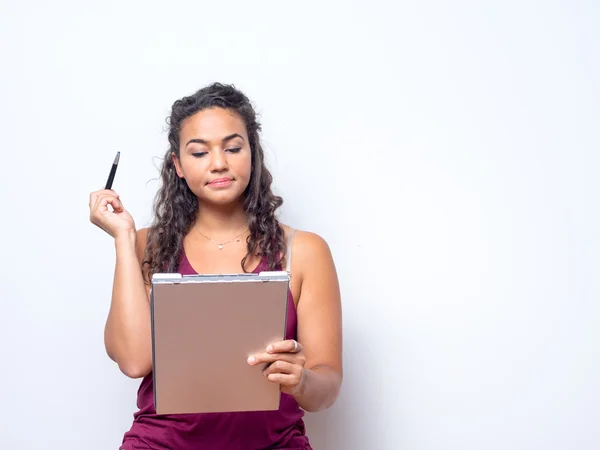 Attractive Woman Of Color Holds Clipboard — ストック写真