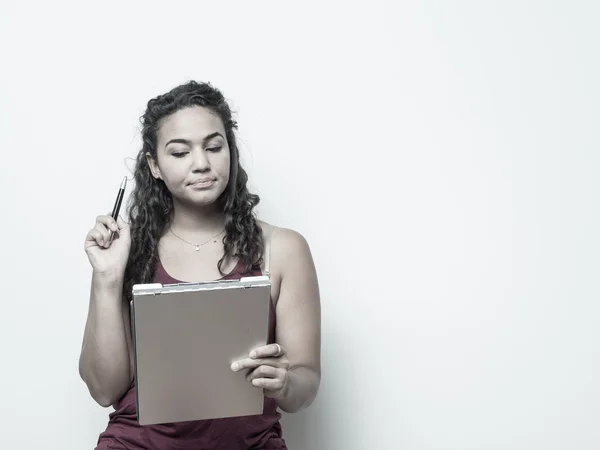 Attractive Woman Of Color Holds Clipboard — ストック写真
