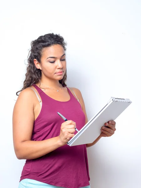 Young Lady Reviewing Paperwork — Stockfoto