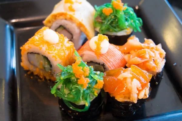 Close up of variety sushi on Black Dish — Stock Photo, Image