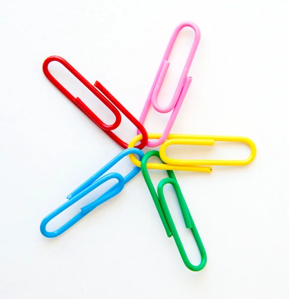 Variety of colorful paper clips on white background — Stock Photo, Image