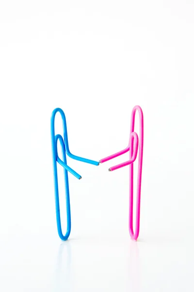 Variety of colorful paper clips on white background : family talk together concept — Stock Photo, Image