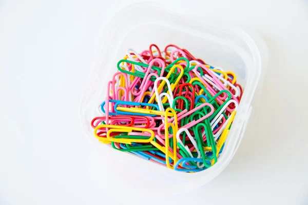 Variety of colorful paper clips on white background — Stock Photo, Image