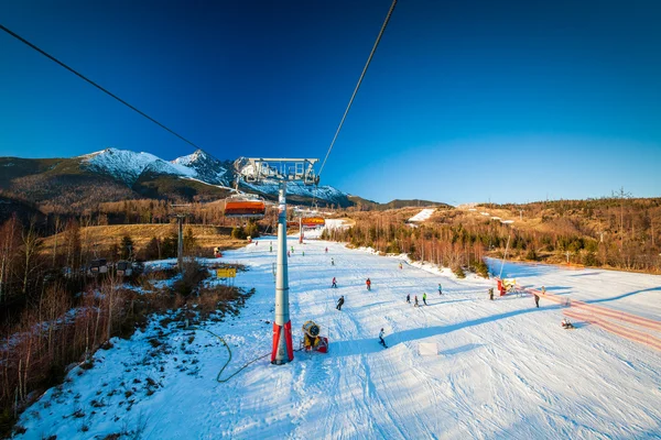 Cable car at a popular ski resort — Stock Photo, Image