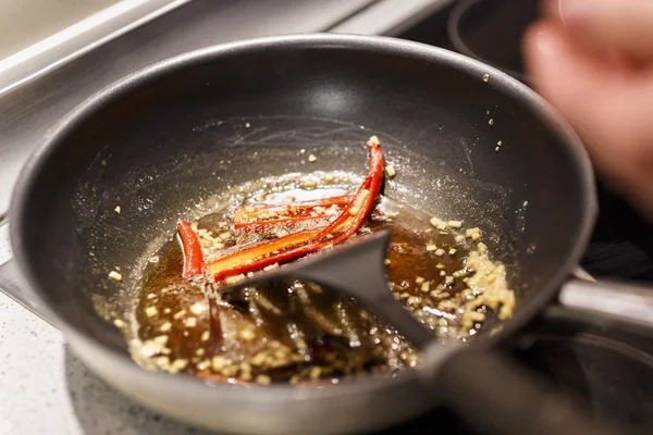 Pan on the stove boiling ingredients — Stock Photo, Image