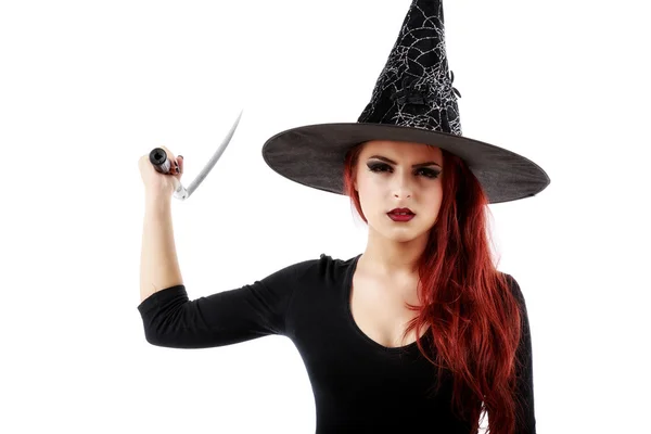 Young witch with scythe isolated on white — Stock Photo, Image