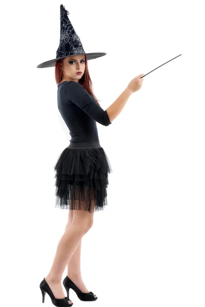 Pretty young redhead witch, isolated against white background — Stock Photo, Image