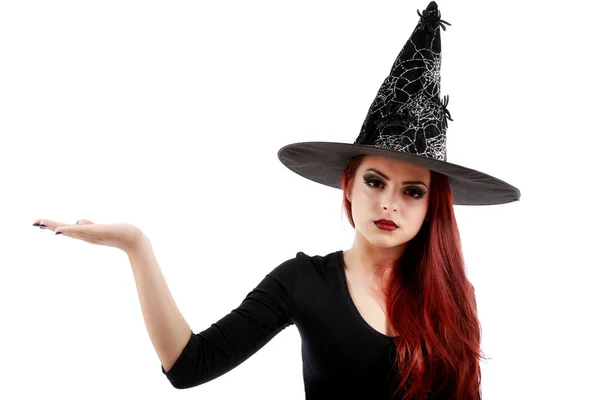 Pretty young happy woman smiling and dressed as a fairy or witch Stock Image