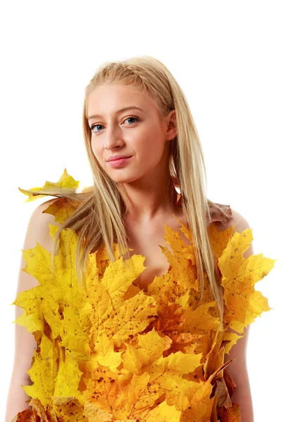 Beautiful blonde with blue eyes in dress of leaves — Stock Photo, Image