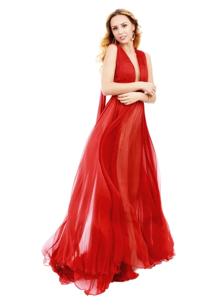 Schoonheid van de jonge vrouw in wapperen rode jurk. witte achtergrond. — Stockfoto