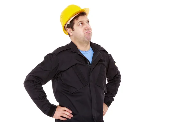 Engineer constructor looks up and sighs — Stock Photo, Image