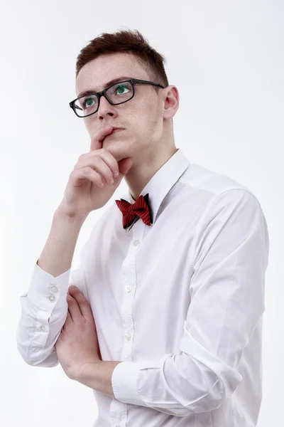 Thinking young  businessman isolated on white background — Stock Photo, Image