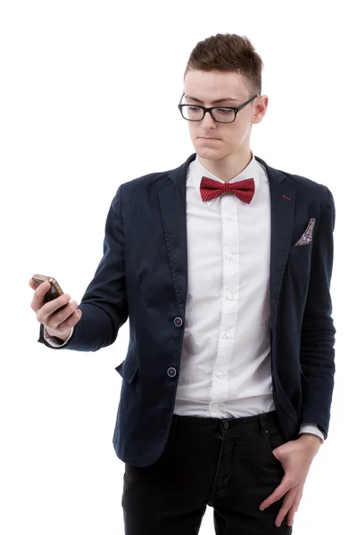 Young businessman looking at cell phone, isolated image — Stock Photo, Image