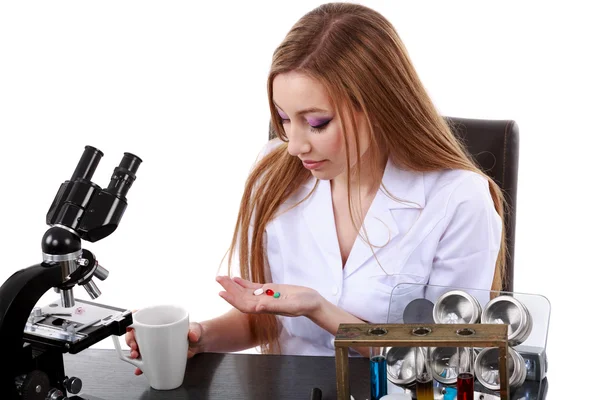Woman scientist who takes pills for migraine — Stock Photo, Image