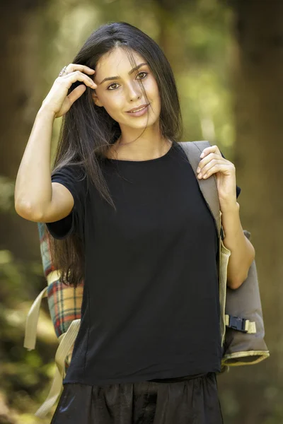 Active healthy beautiful woman hiking in  forest — Stock Photo, Image