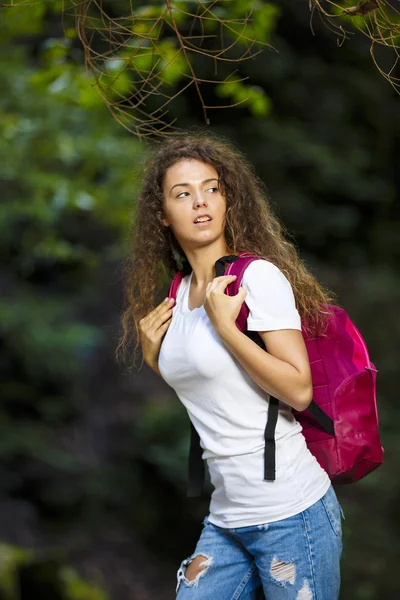 Young European woman hiker by the river, outdoors activities — Stock Photo, Image