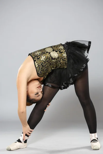 Professional female ballet dancer isolated in studio — Stock Photo, Image
