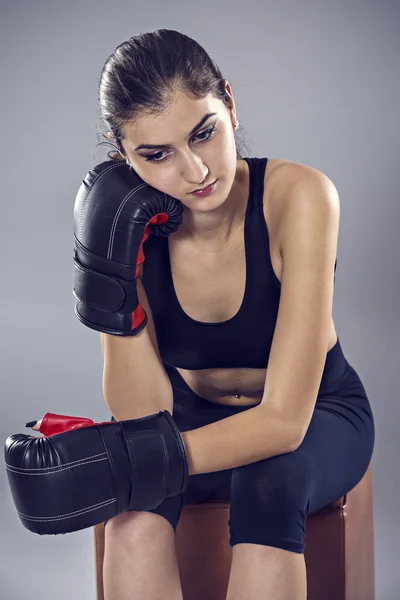 Sport young woman boxing gloves, face of fitness girl studio sho — Stock Photo, Image