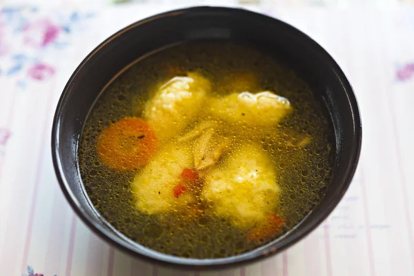 Bowl with semolina dumplings soup — Stock Photo, Image