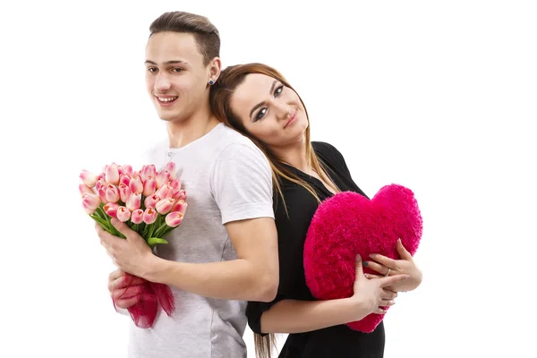 Happy couple with a bouquet of tulips, valentines day theme — Stock Photo, Image