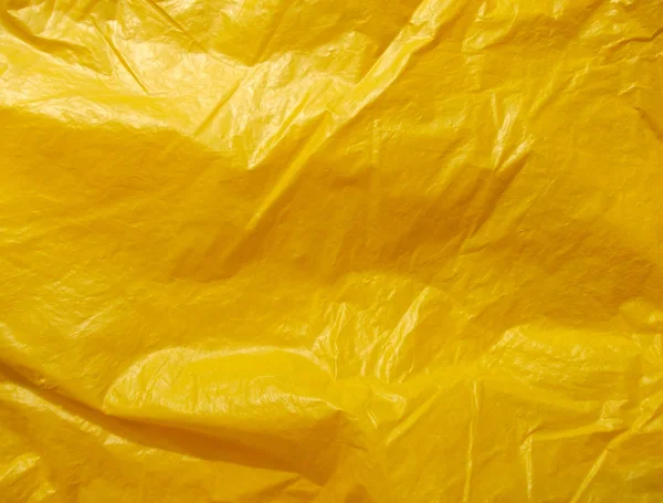 Texture en plastique jaune plissé — Photo